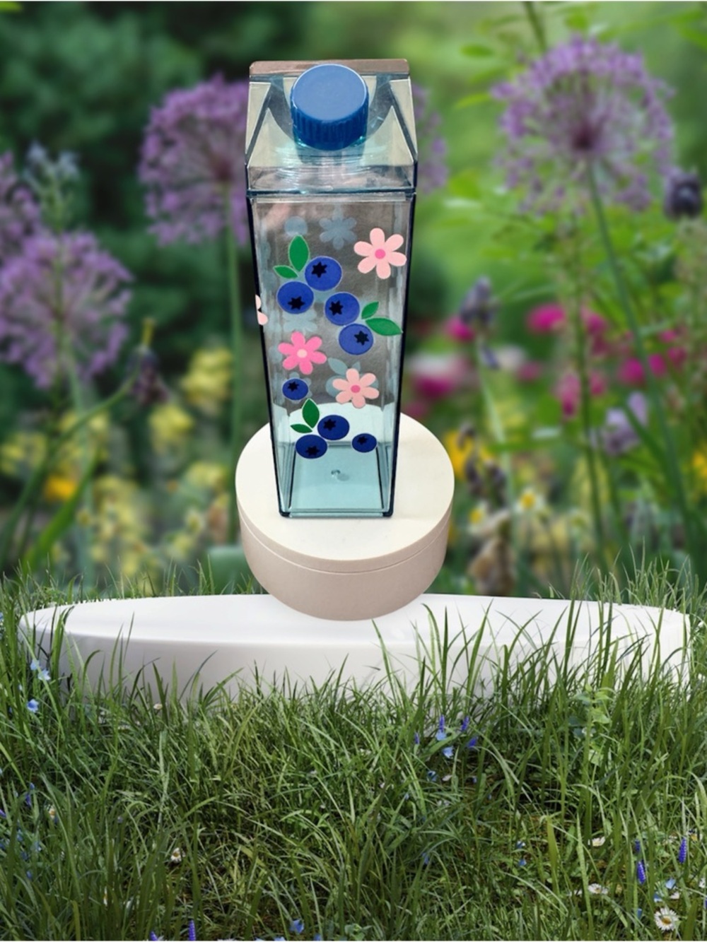 Blueberries and flower milk container